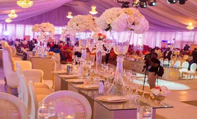 Nigerian event budget spreadsheet on a laptop